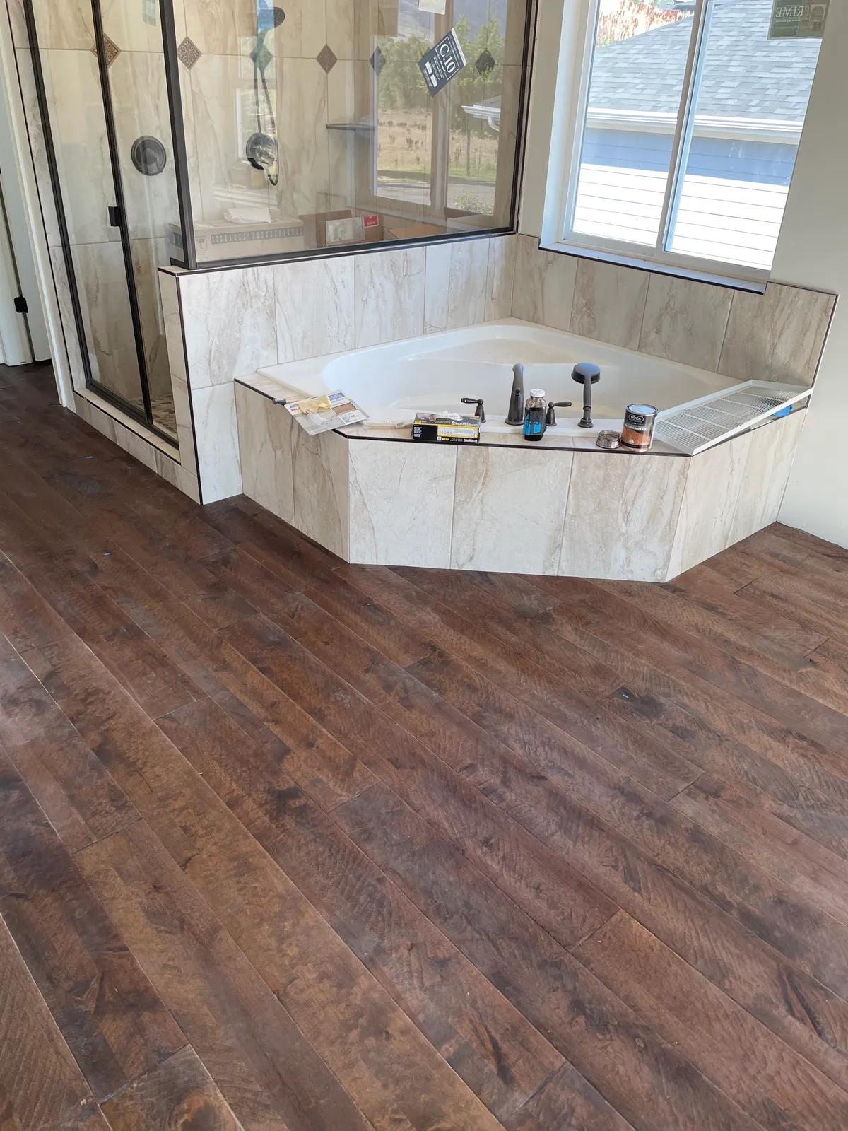 Hardwood flooring near bathroom in a Utah home