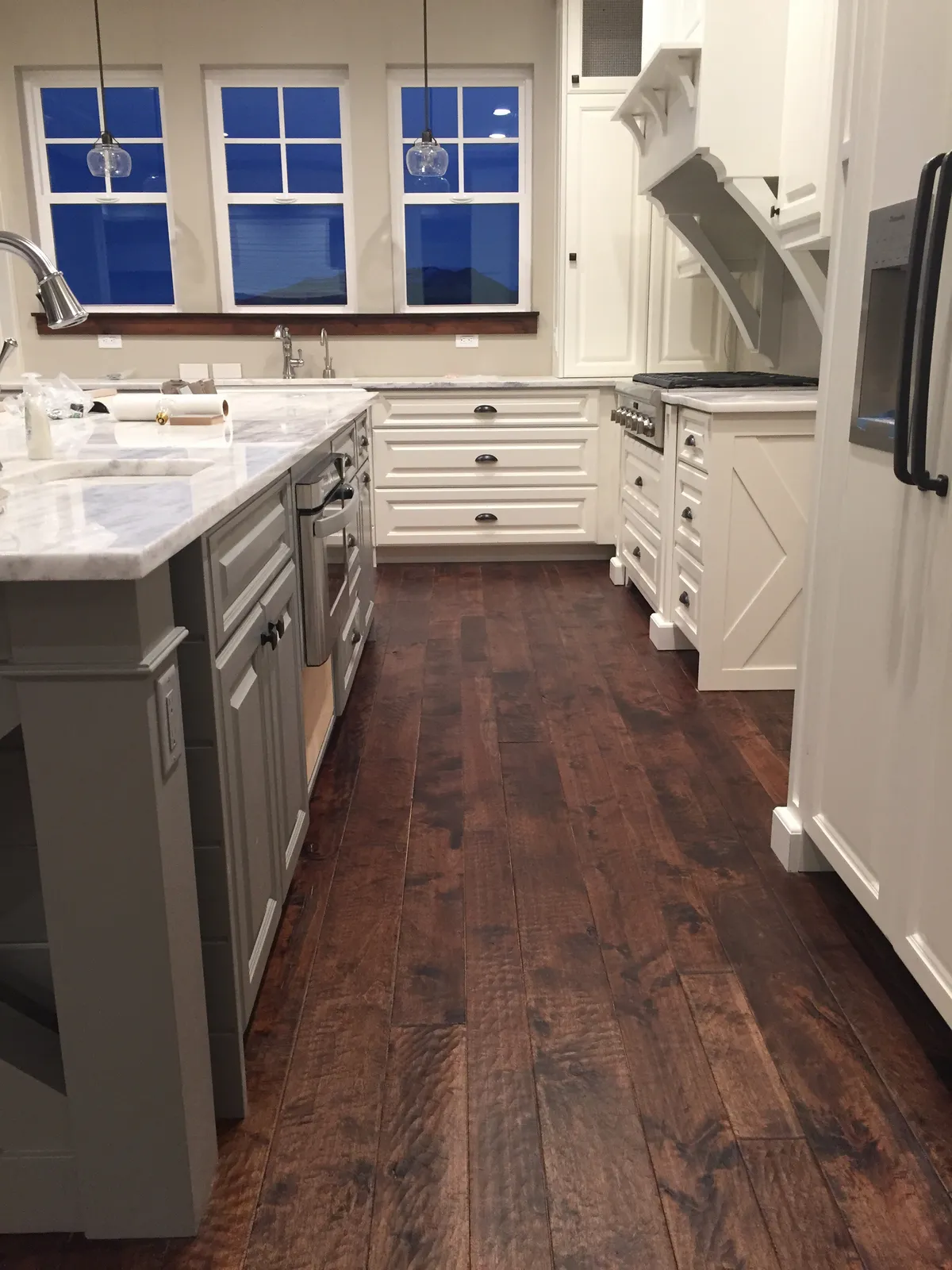 Dark hardwood kitchen with white cabinets, Murray, UT