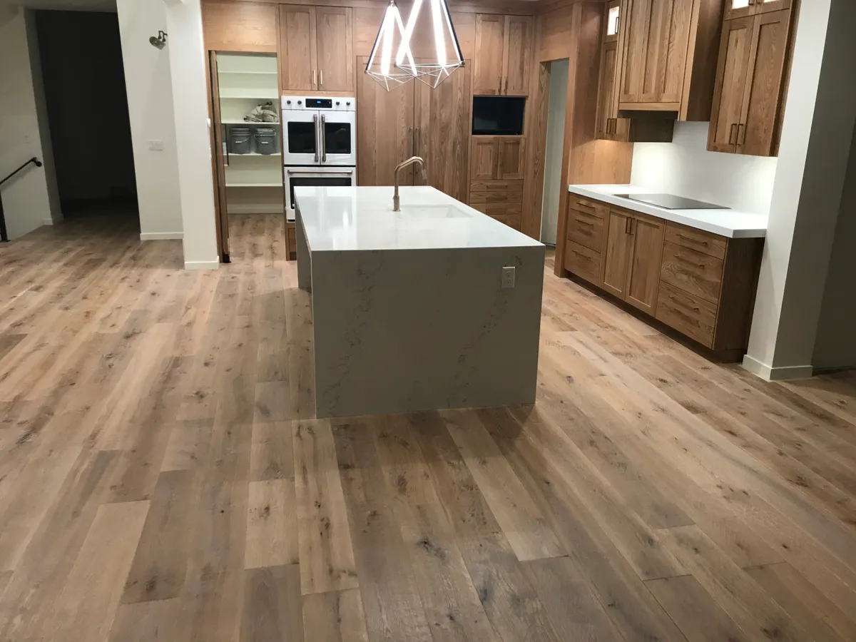 Light oak hardwood in kitchen with white cabinets, Herriman, UT