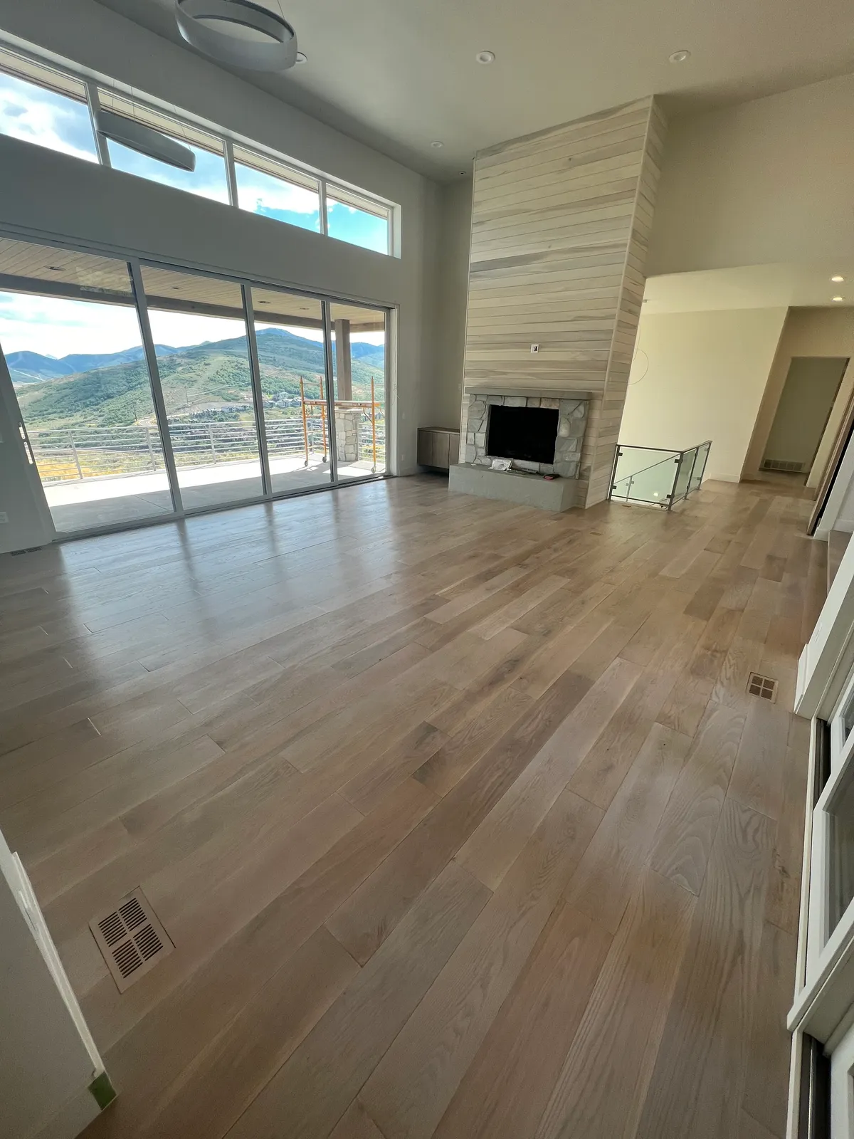 Warm toned hardwood in living room, Taylorsville, UT