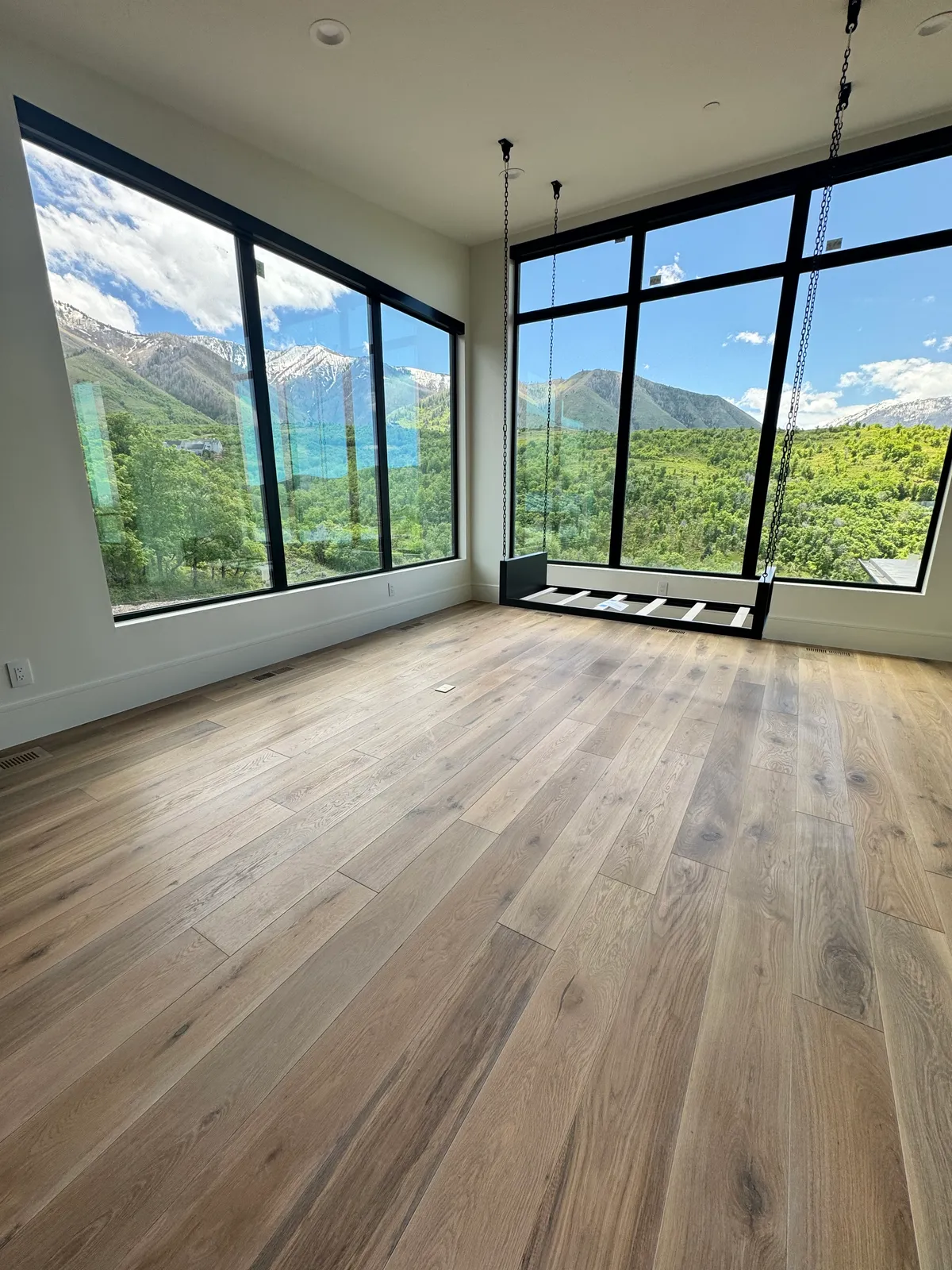 Modern wide plank hardwood in mountain luxury home